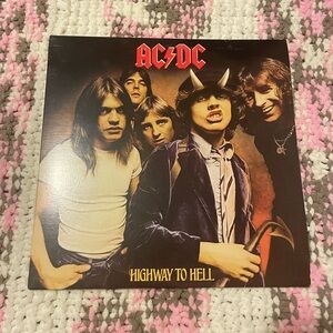 AC/DC Vinyl Album with Red Logo and Black, Cream Tones